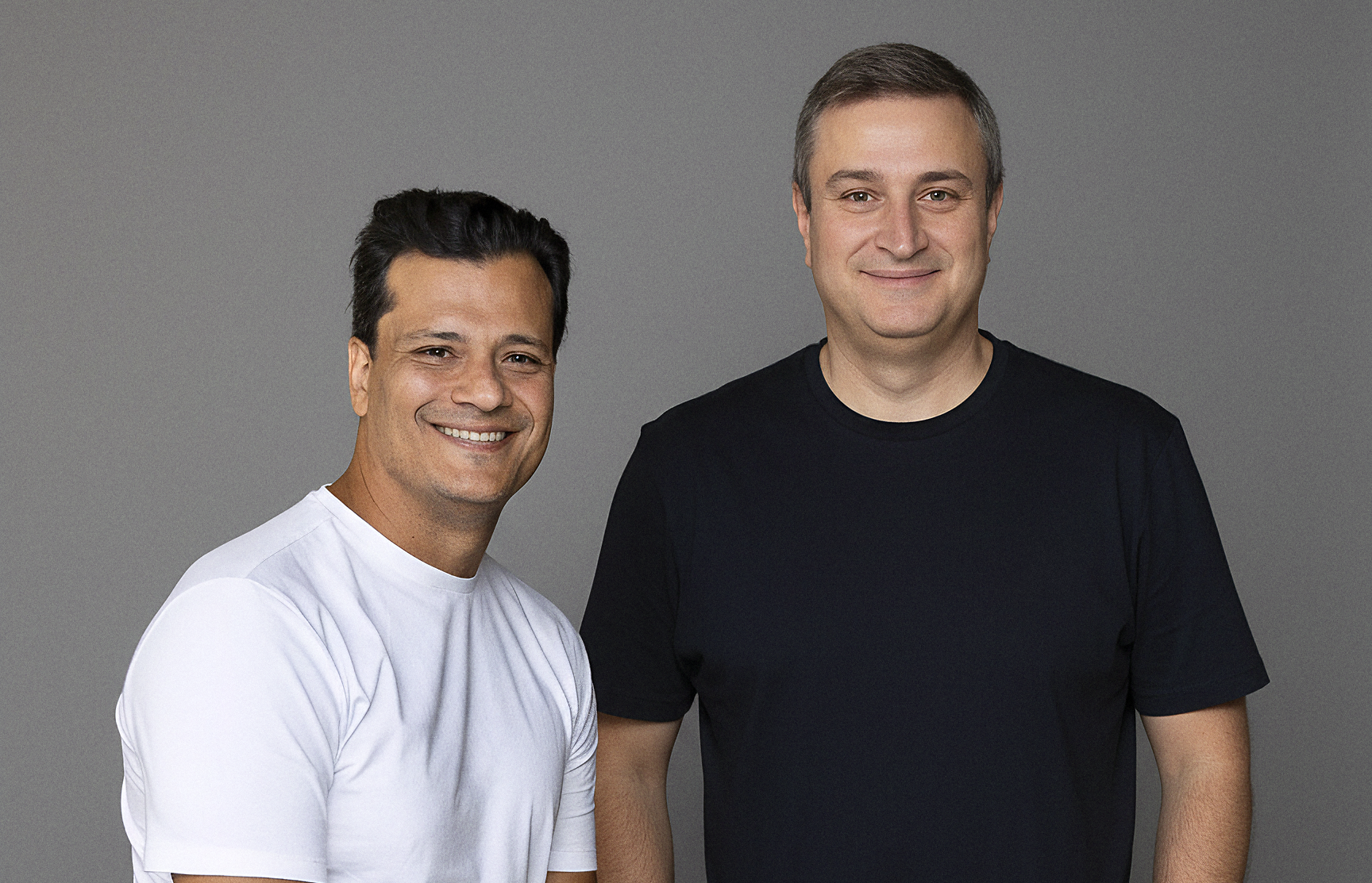Juliano Tubino (à esq.), CEO do grupo Alun, e Junior Borneli, CEO e fundador da StartSe